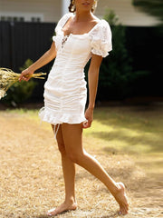 Hip-Hugging Pleated Mini Dress